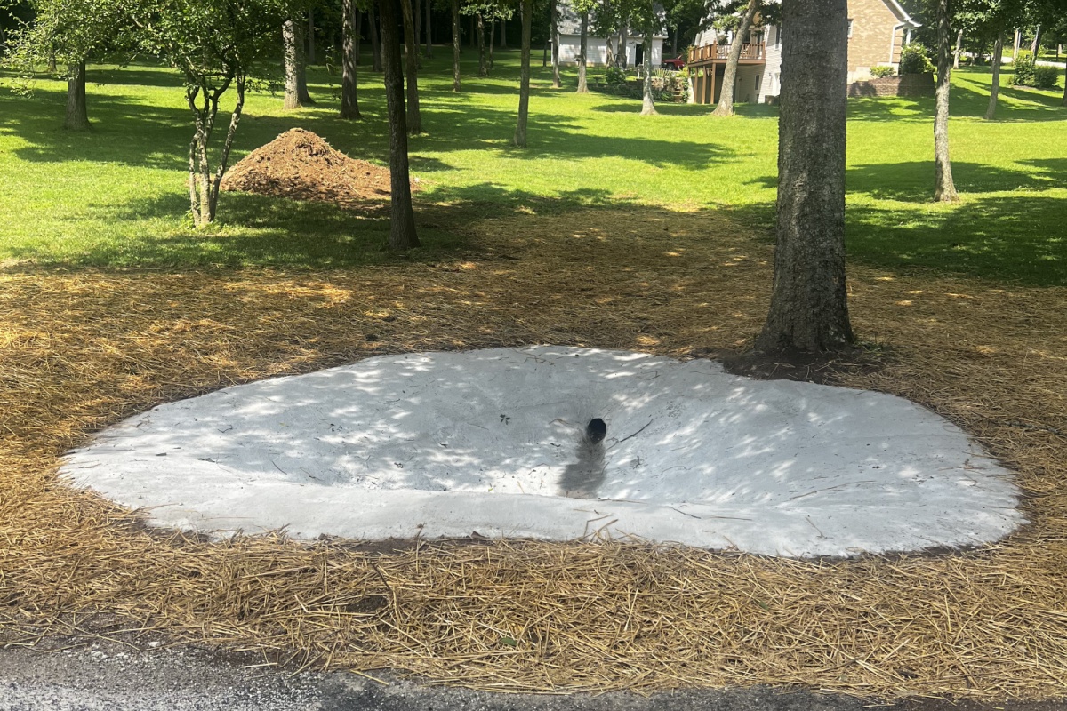 Our professional hardscaping contractors seamlessly blended the Culvert pipe installation into the customer's landscape