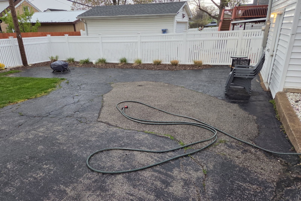 Our customer's backyard before our expert hardscaping contractors performed a paver patio installation in South County